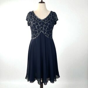 J Kara Navy Sequin and Chiffon Open V-Neck Below Knee A-Line Cocktail Dress